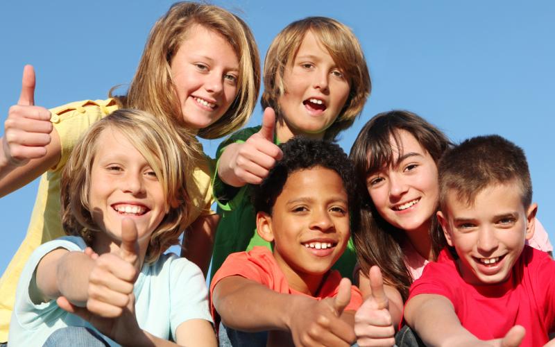 Group of happy youth at summer camp