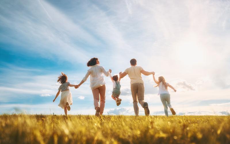 Healthy Family in Wheat Field