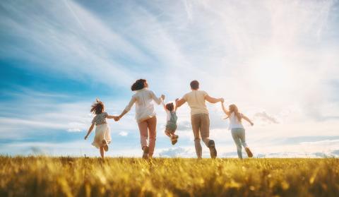 Healthy Family in Wheat Field
